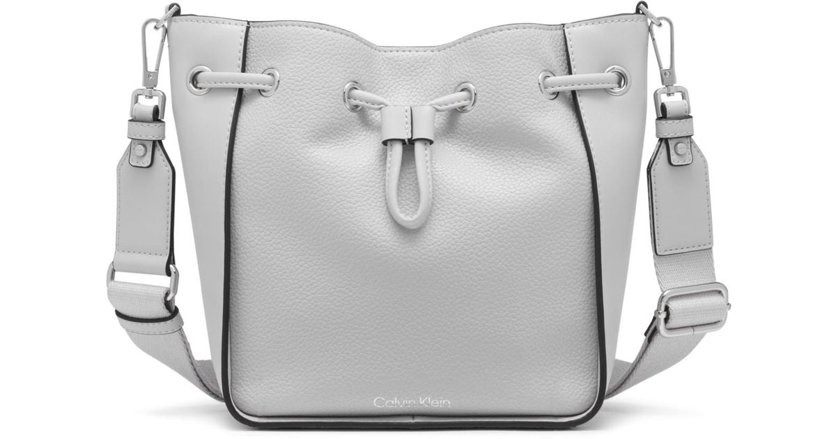 Calvin Klein Holt Drawstring Crossbody Bag in Gray | Lyst