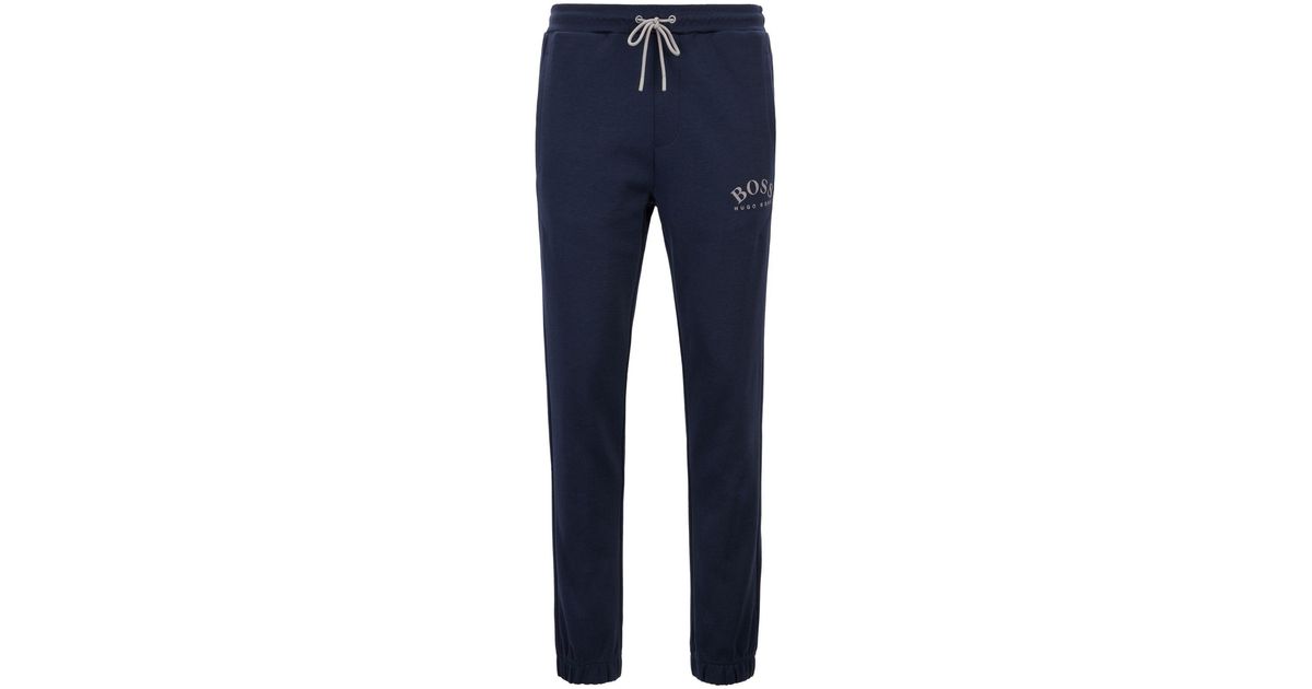 BOSS by HUGO BOSS Cotton Slim-fit jogging Pants With Curved Logo in Navy (Blue) for Men - Lyst