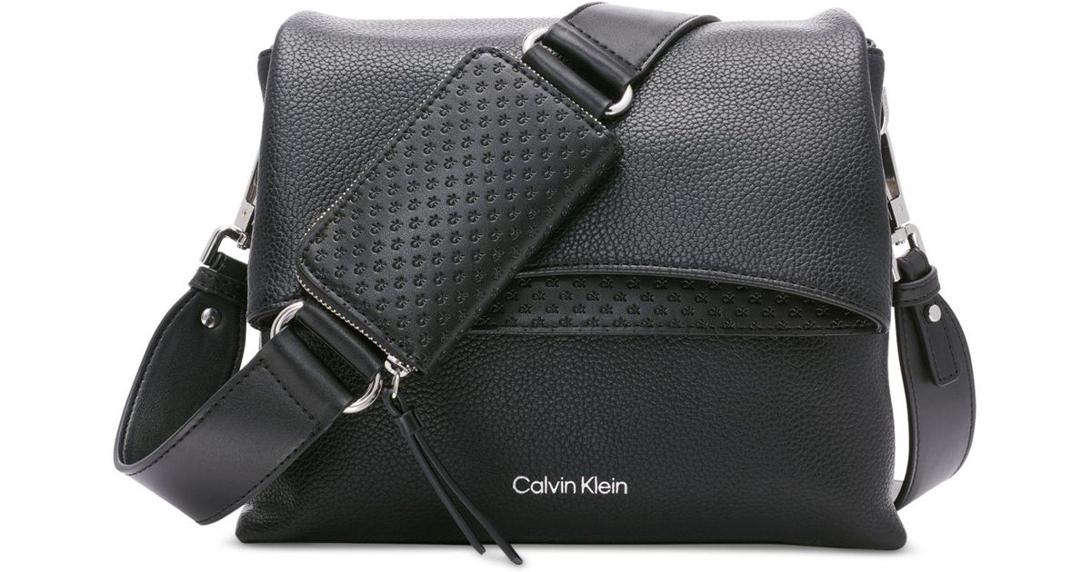 Calvin Klein Chrome Embossed Signature Small Crossbody in Black | Lyst