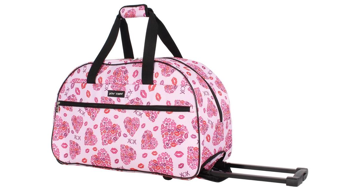 Betsey Johnson Carryon Softside Rolling Duffel Bag in Pink Lyst