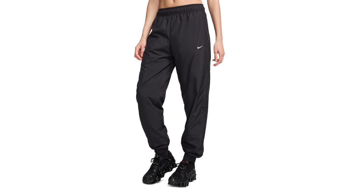 Nike Sportswear Classic Woven Mid rise Jogger Pants In Black Lyst nike-sportswear-classic-woven-mid-rise-jogger-pants-in-black-lyst