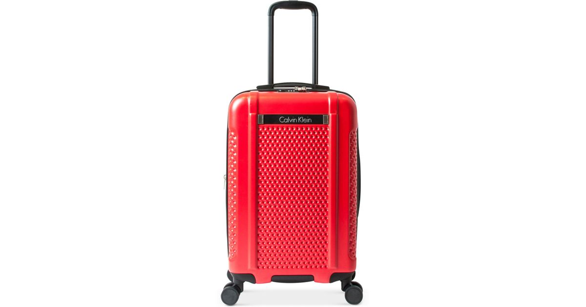 red calvin klein luggage