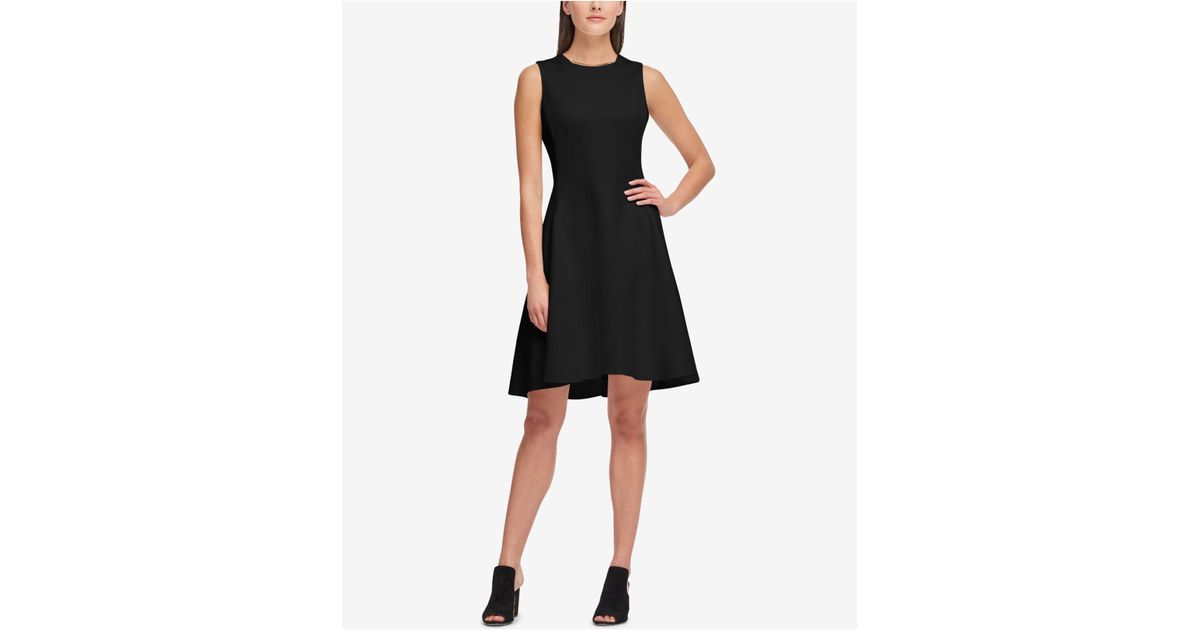 black sleeveless fit and flare dress