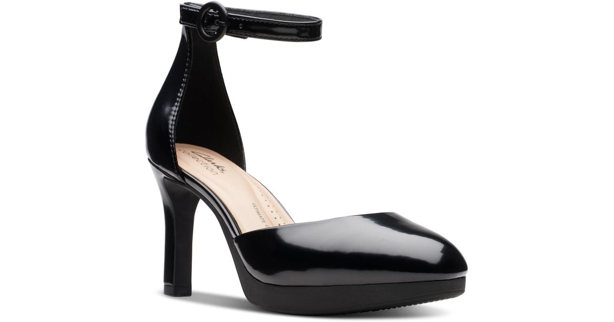 black platform pumps with ankle strap