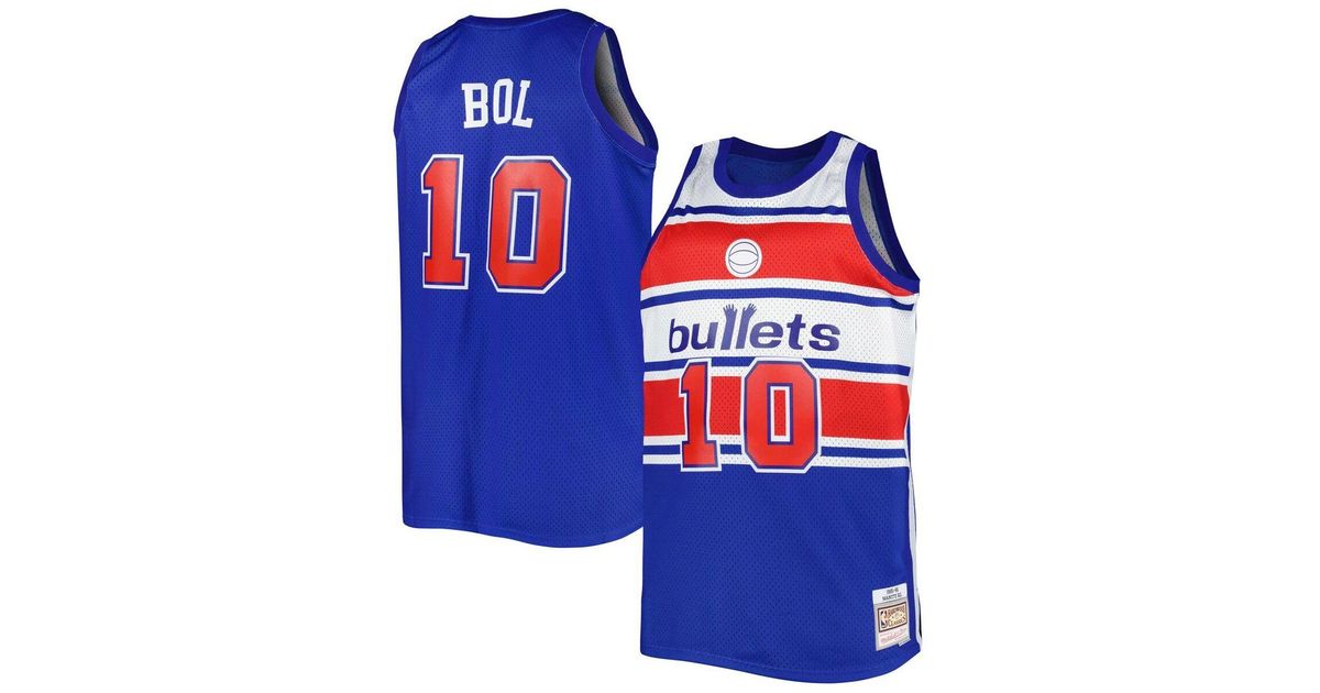 Manute Bol Of The Washington Bullets Battles For A Rebound With Kurt