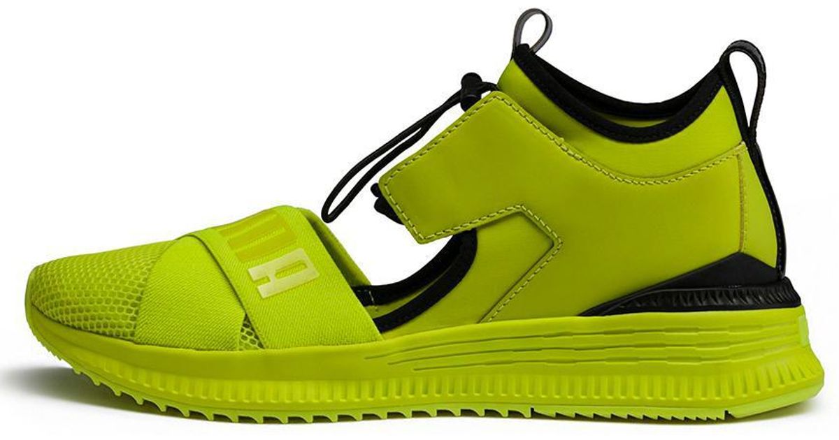 black and lime green puma shoes