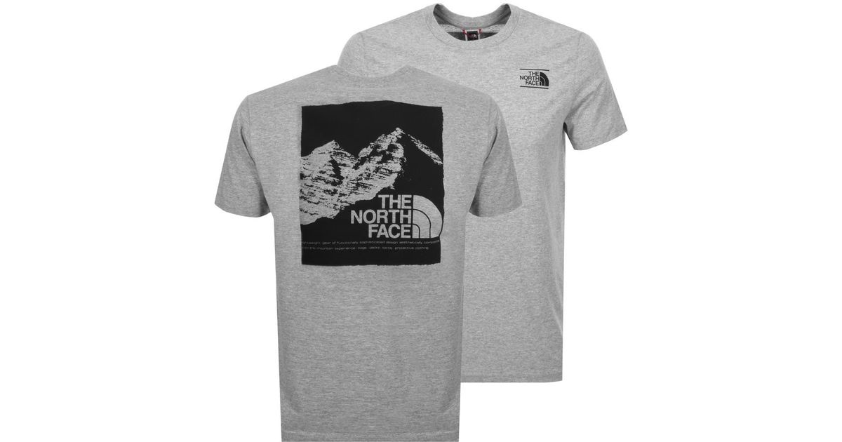grey north face shirt
