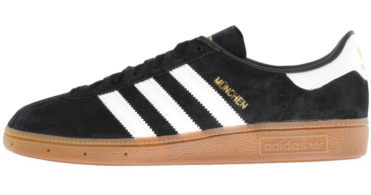 adidas black munchen trainers
