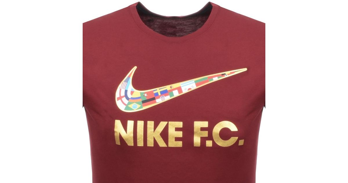 burgundy nike shirt