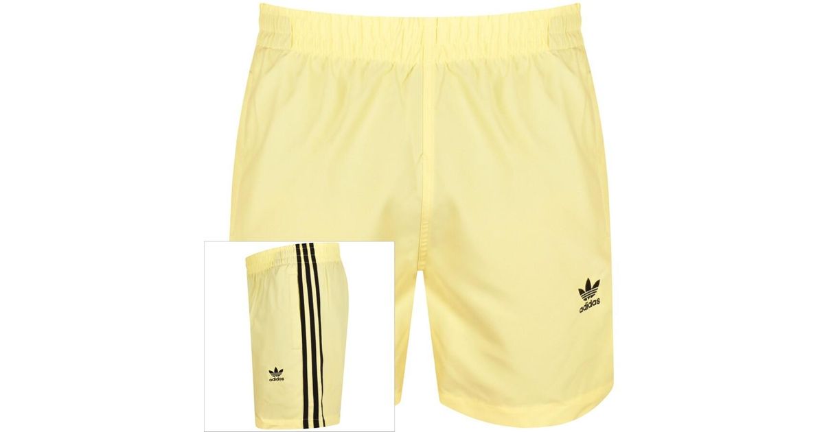 Adidas swim shop shorts yellow