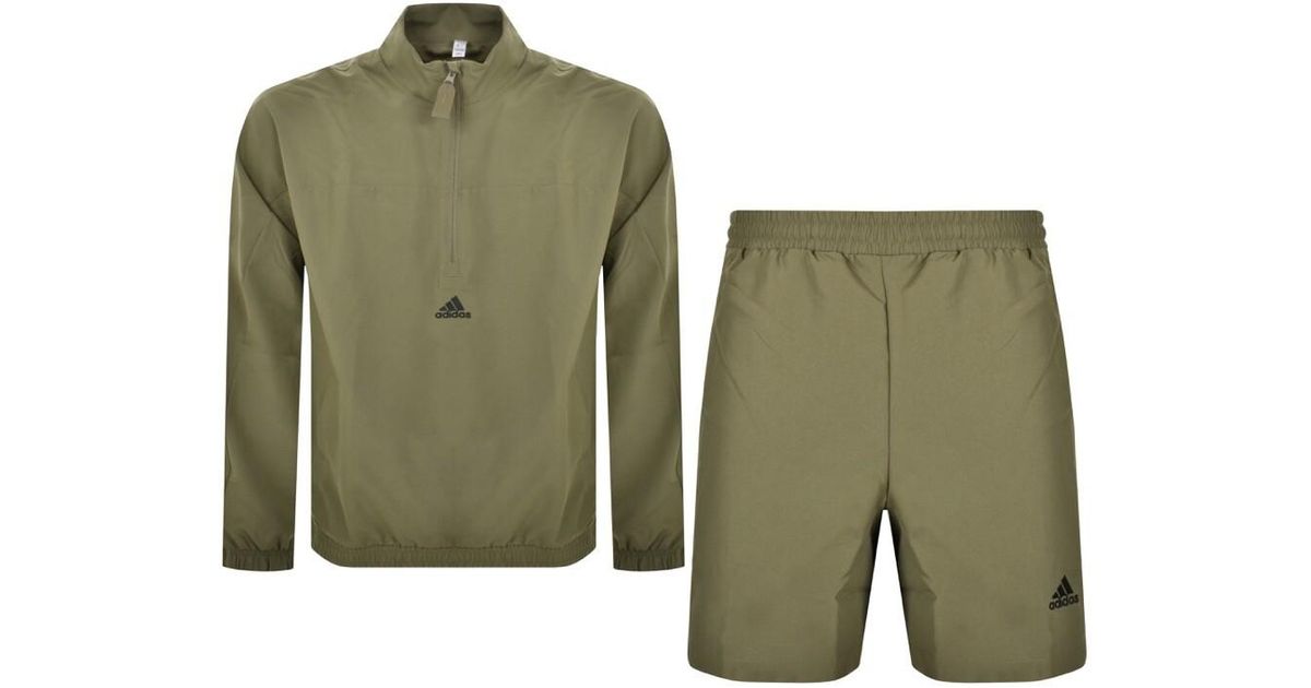 Adidas short sleeve tracksuit deals
