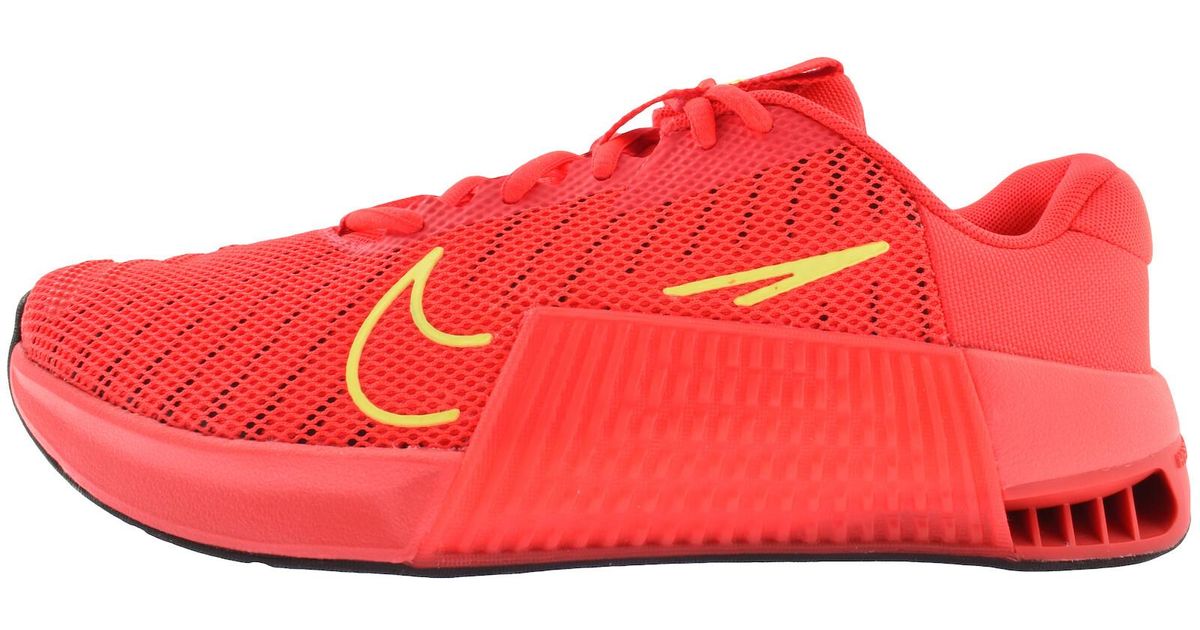nike red and yellow trainers