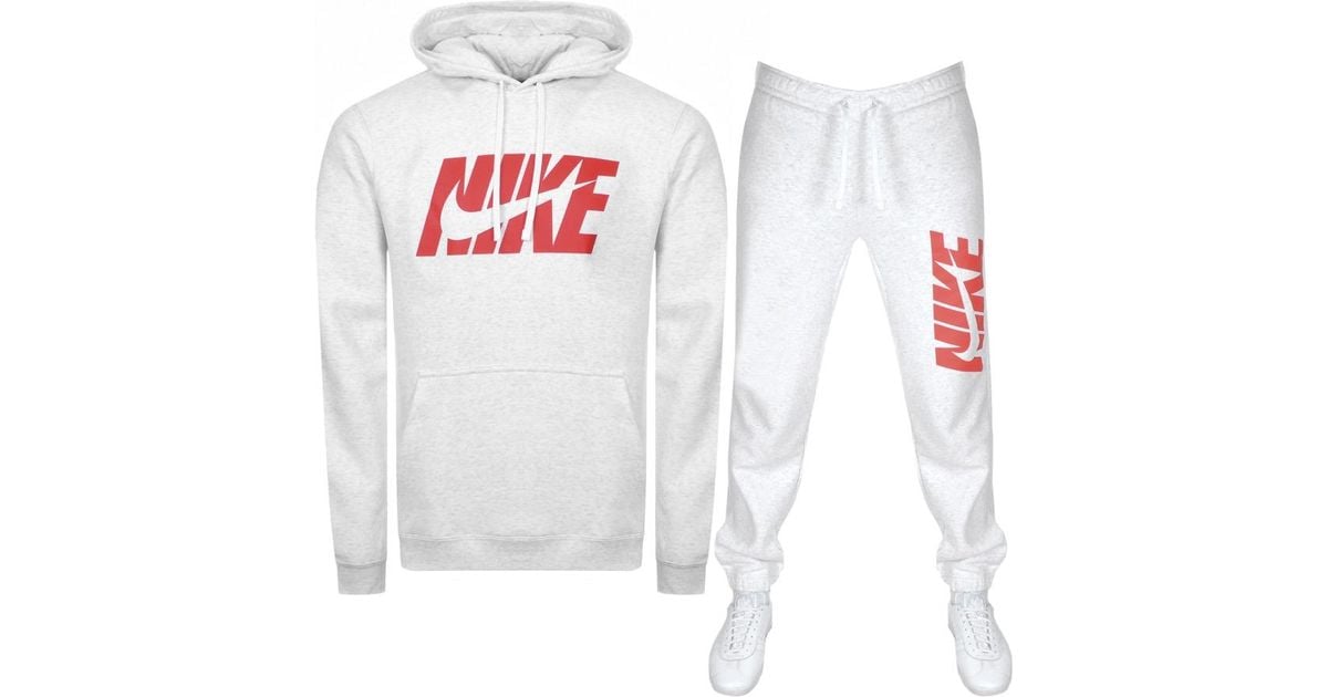 white and red nike tracksuit