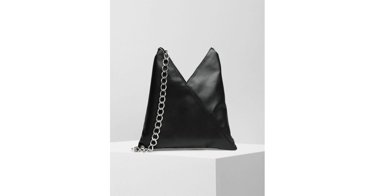black small bag with chain