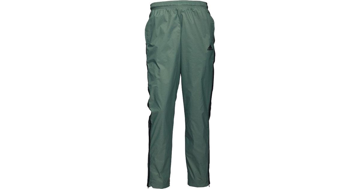 adidas lime green stripe track pants
