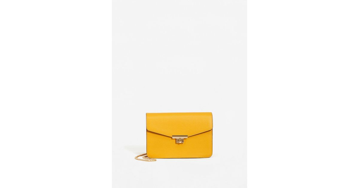 mango mustard yellow solid sling bag