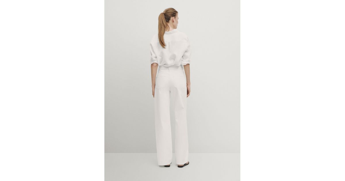 NWT. Massimo Dutti Off White High-Waist Split-Hem newest Trousers/Jeans. Size 6.