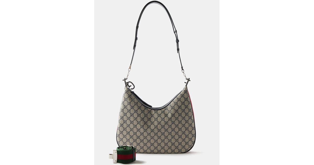 Gucci Linea Large GG Supreme Canvas Hobo Bag in Natural