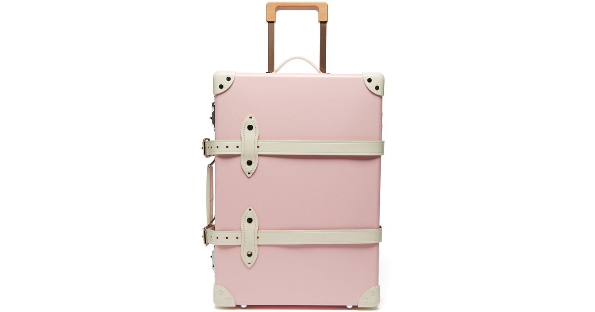 pink trunk suitcase
