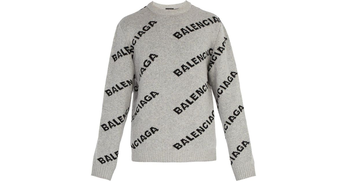 grey branded jumper
