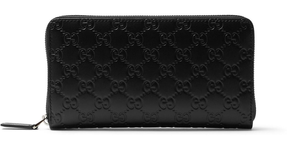 Gucci Gg-debossed Leather Travel Wallet in Black for Men - Lyst