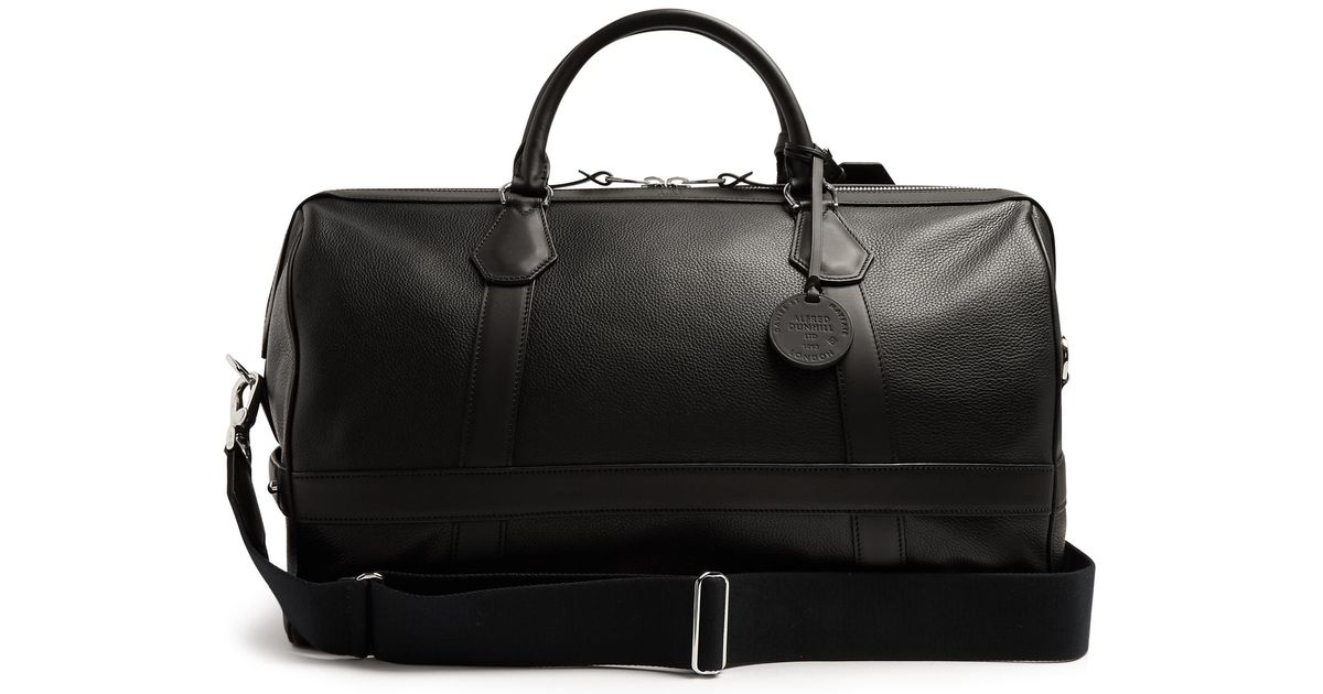 black leather holdall bag