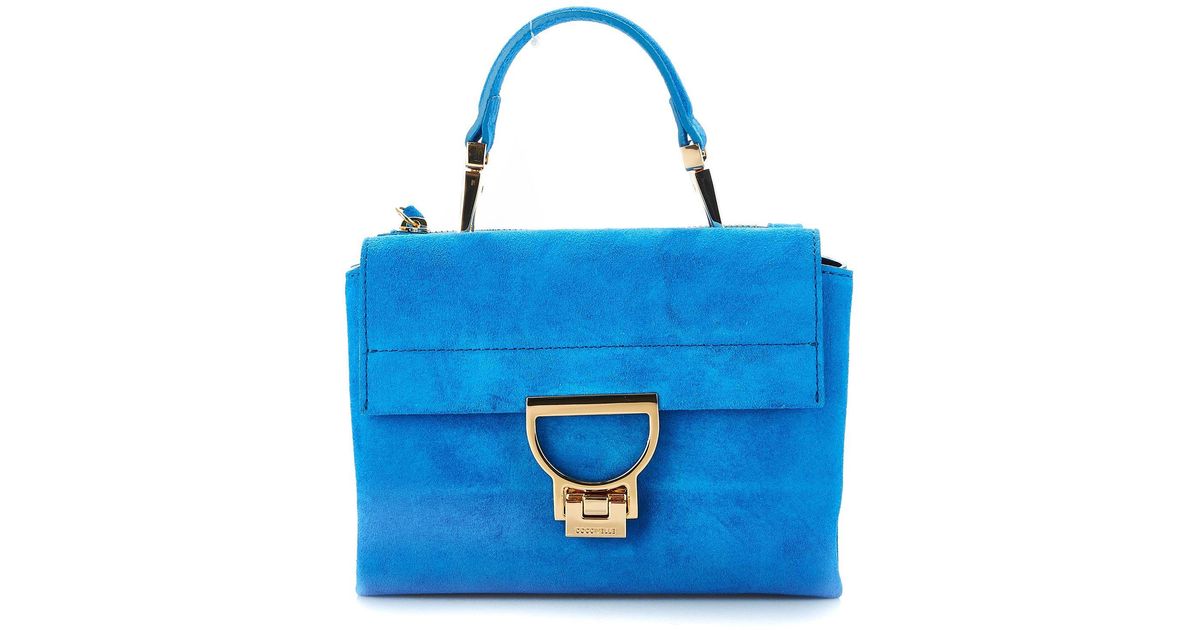 light blue suede handbag