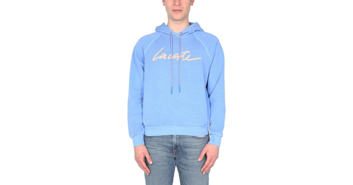 light blue lacoste sweatshirt