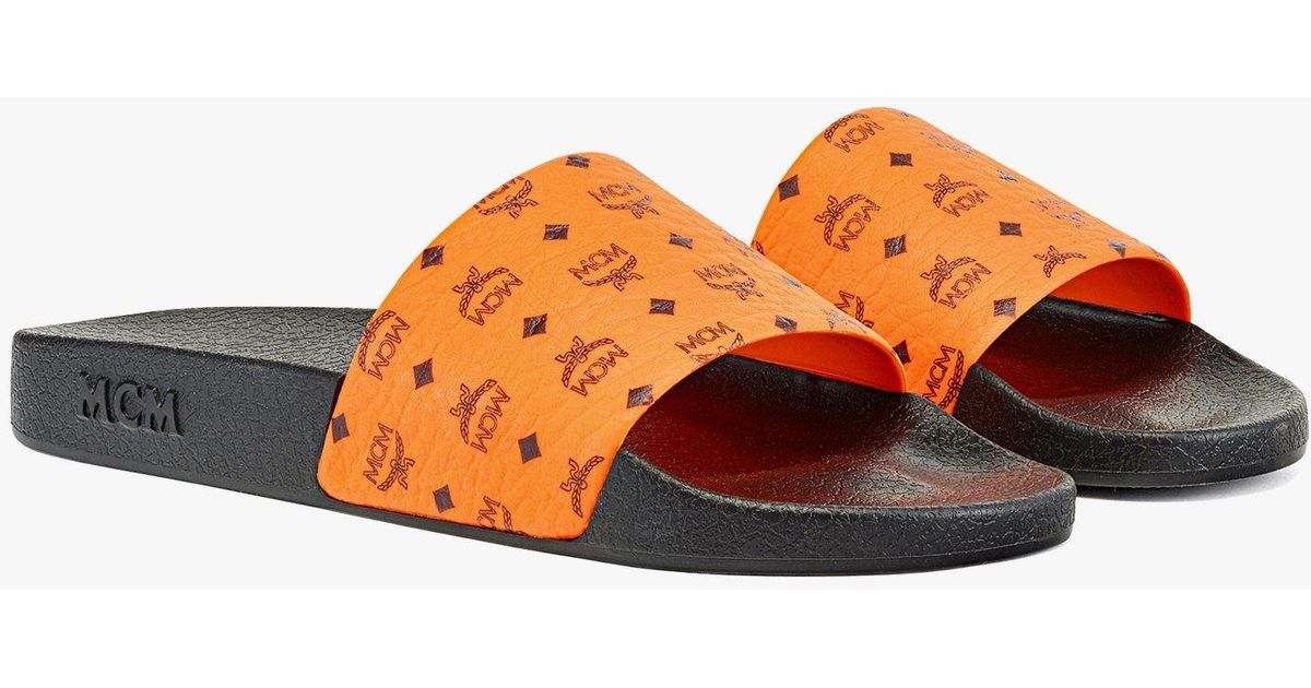 women's monogram print rubber slides