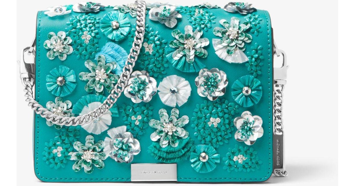 jade floral sequined leather clutch