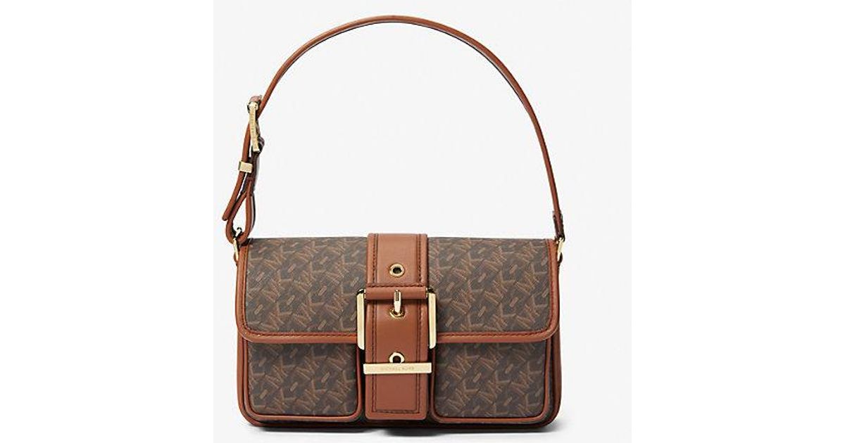 michael michael kors colby embossed signature logo sneakers