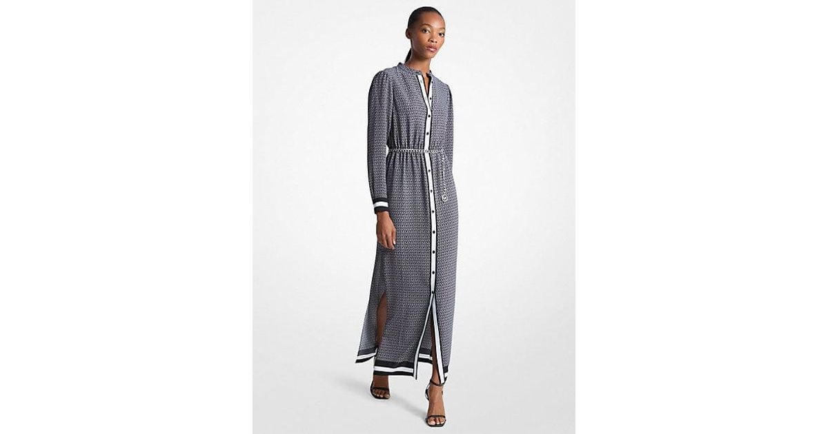 empire logo print satin belted dress A night of jet set glam at @MichaelKors' Empire Jacquard Launch Party yesterday. I am dressed in the new Empire Logo Print Satin Belted Dress a polished ruffled midi dress crafted from