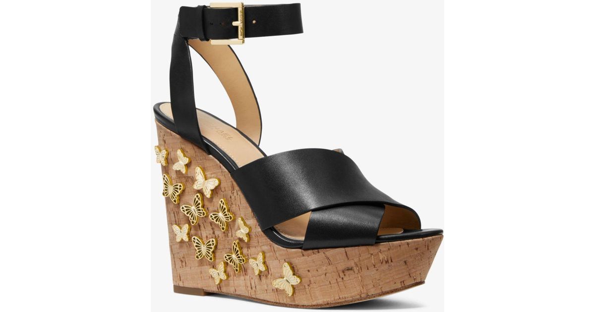 lacey butterfly embellished leather wedge