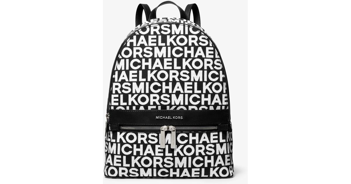 mk black and white backpack