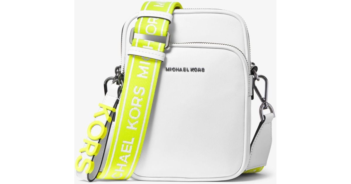 Michael Kors Medium Leather Neon Logo Tape Crossbody Bag in White | Lyst