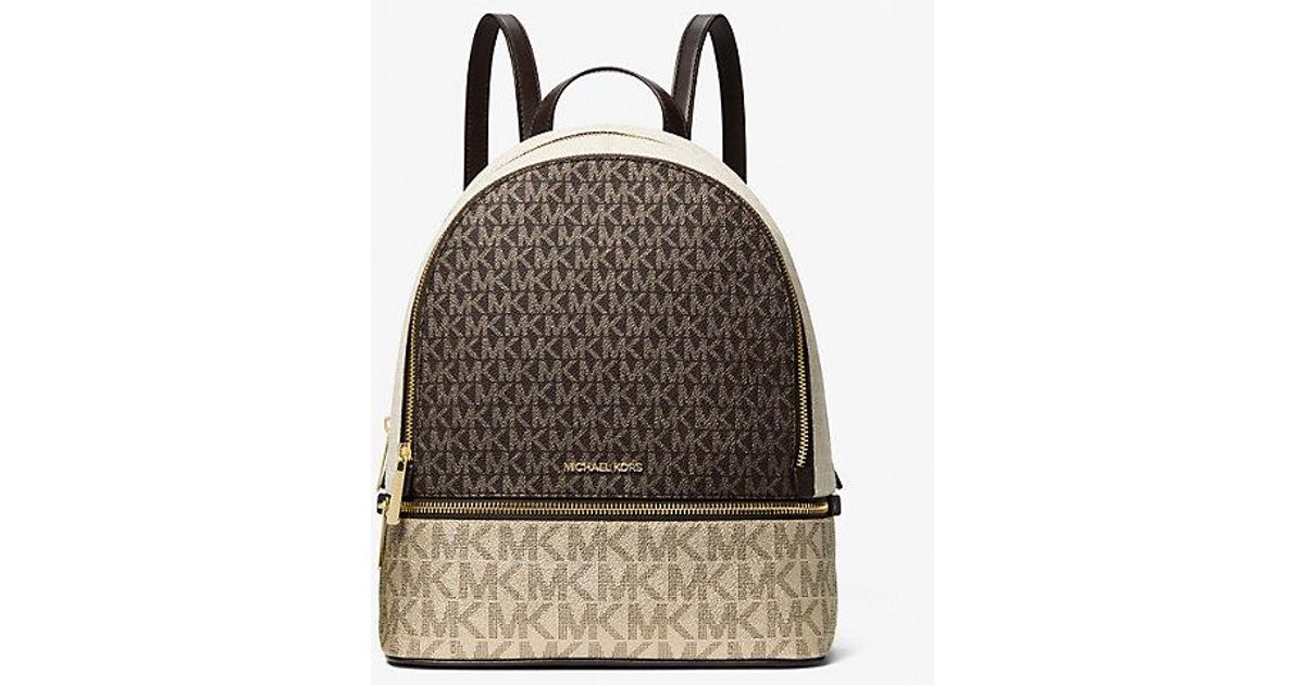 Michael Kors Rhea Medium Metallic Signature Logo Backpack in Brown | Lyst