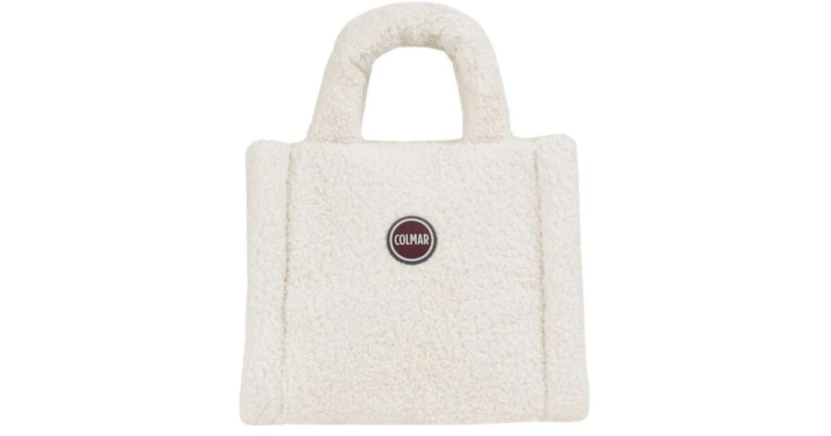 Borsa mini shopper in pelliccia sintetica di Colmar in Bianco Lyst