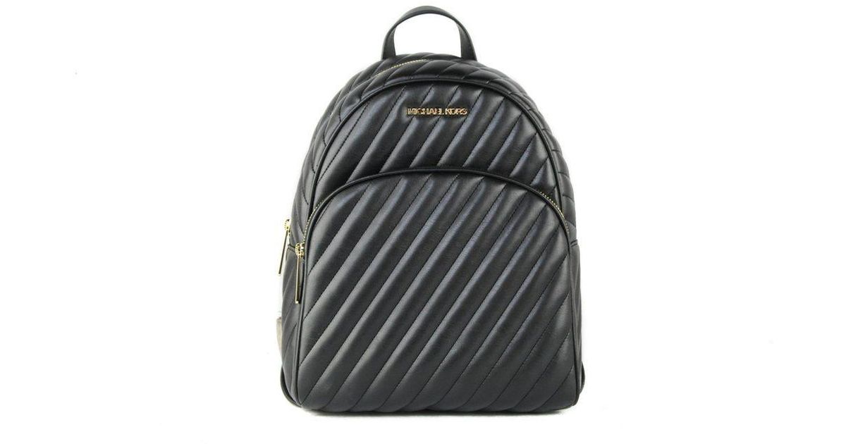 mk quilted backpack