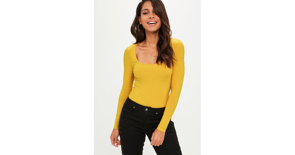 yellow long sleeve bodysuit