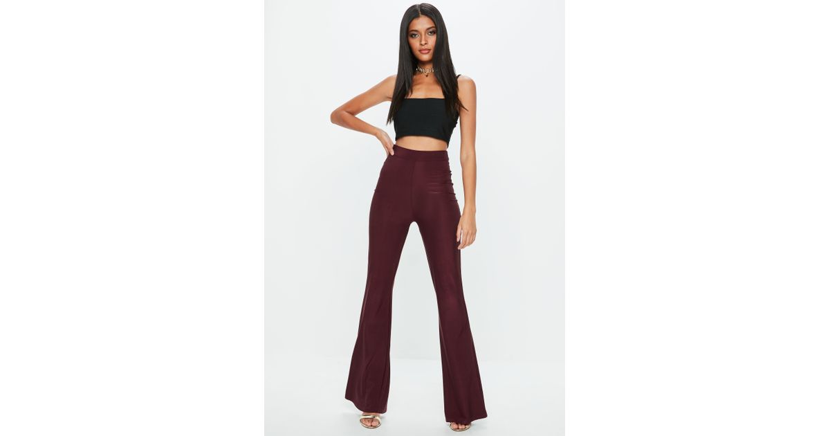 black slinky flared trousers
