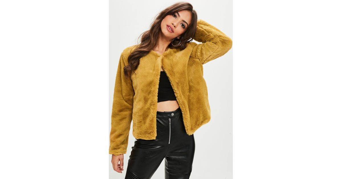 mustard yellow fur jacket