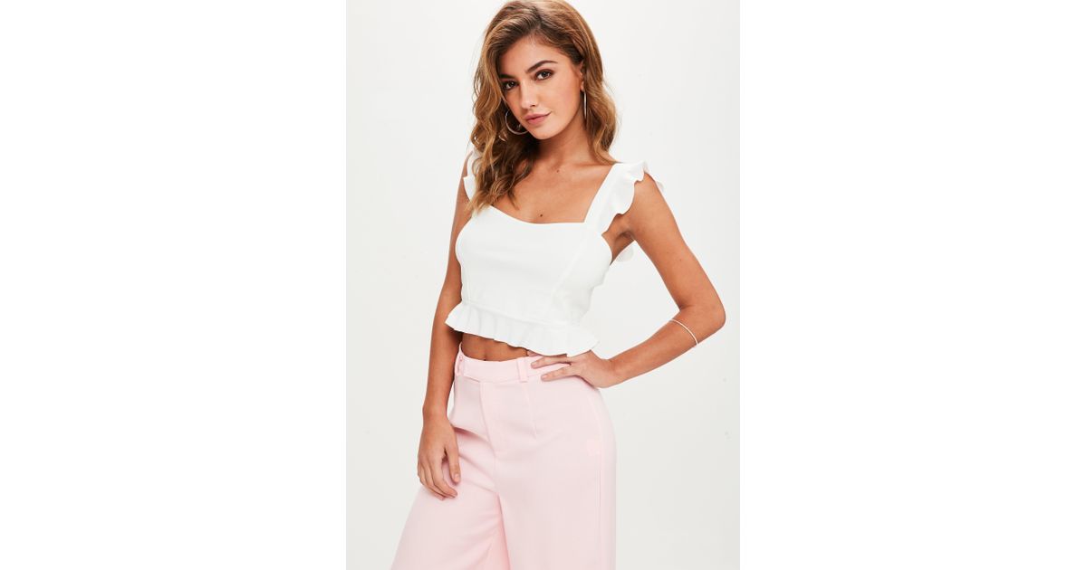 white frilly top