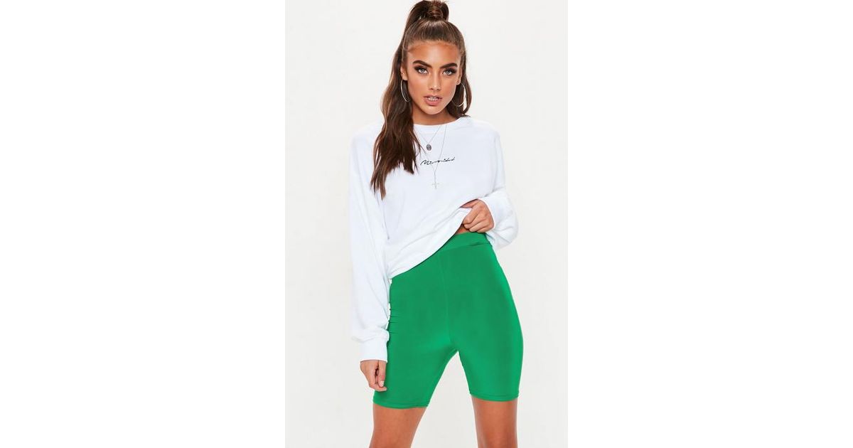 green cycling shorts