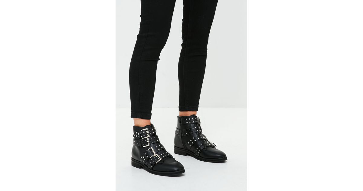 black studded buckle ankle boots