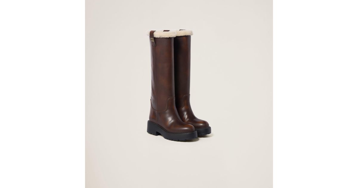 MIUMIU 26S BOOTIES IN DARK BROWN  FUME CALFSKIN