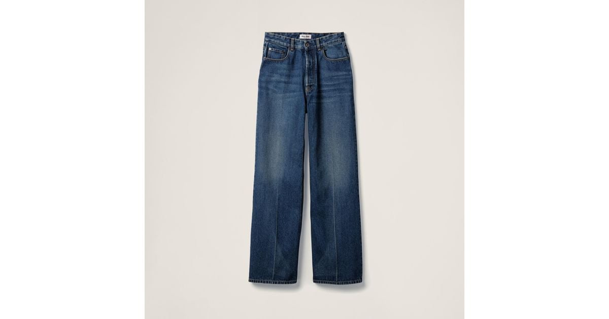 【関税&送料込】Miu Miu Denim Flock Jeans Miu Miu Washed Denim Flared Jeans in Blue | Lyst