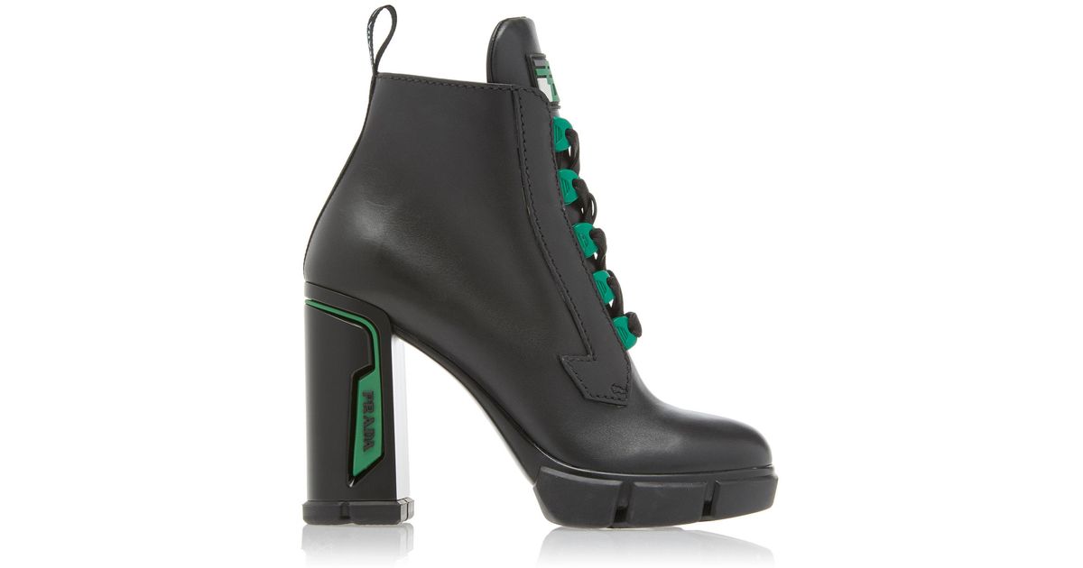 Prada Tronchetti Leather Ankle Boots in Black | Lyst