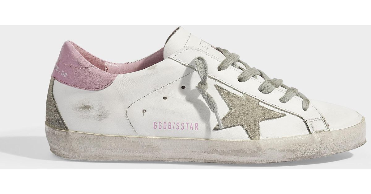 white and baby pink superstars