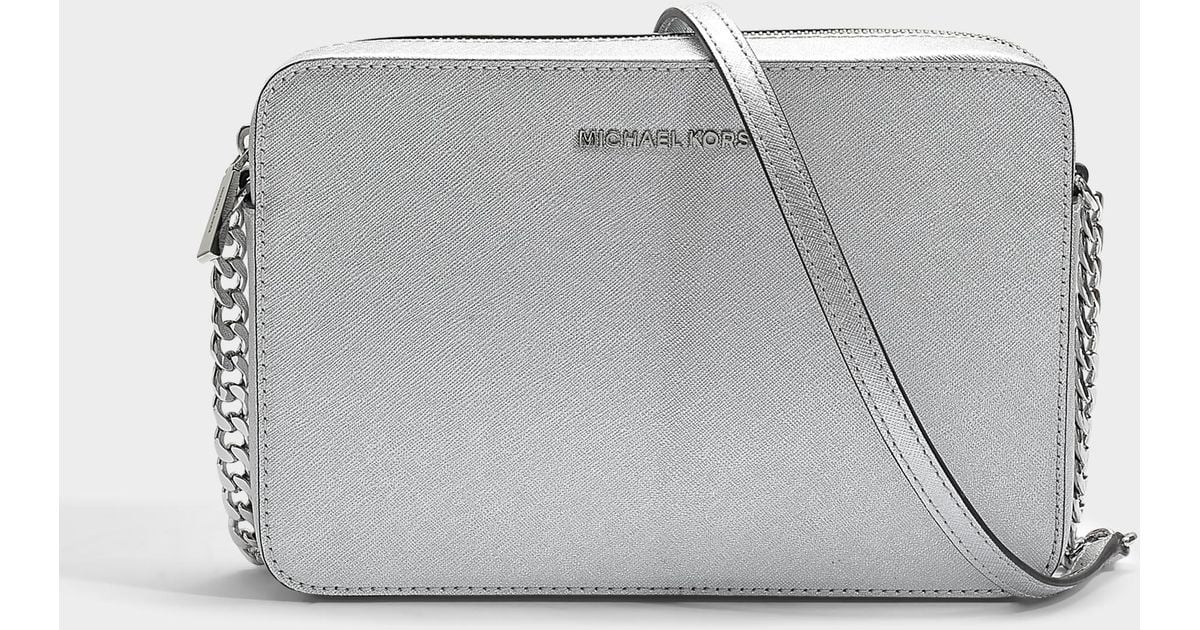 Michael Kors Jet Set Travel MD Dome XCross Crossbody bundled with SM TZ  Coinpouch Purse Hook (2022 Silver Holiday): Handbags: Amazon.com