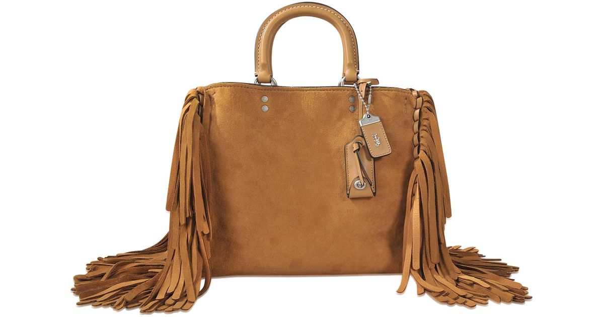 coach suede fringe bag